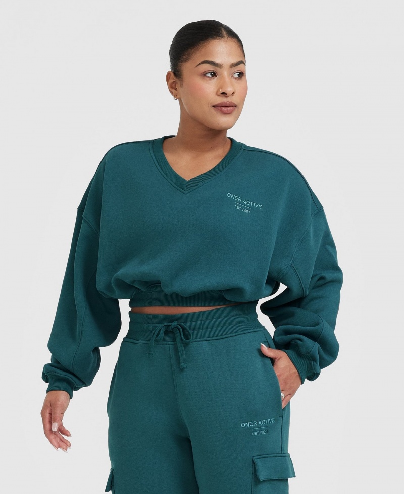 Blue / Turquoise Oner Active All Day Est 2020 Crop V-Neck Sweatshirts | 73985FICD