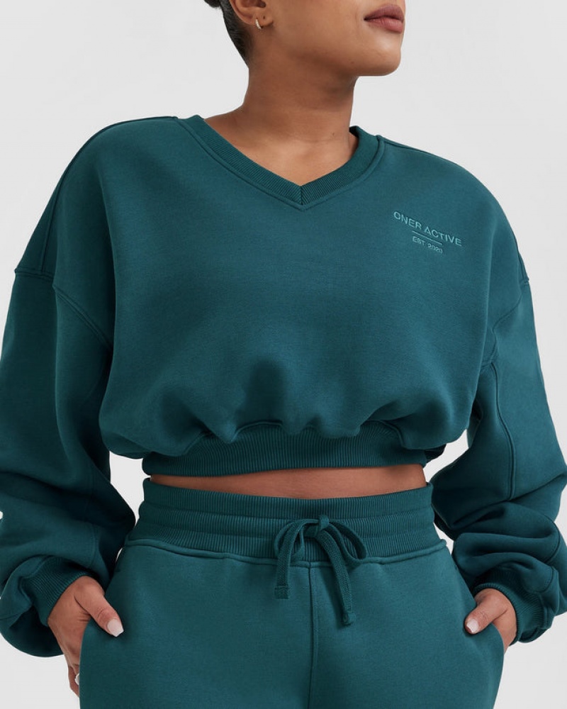 Blue / Turquoise Oner Active All Day Est 2020 Crop V-Neck Sweatshirts | 73985FICD