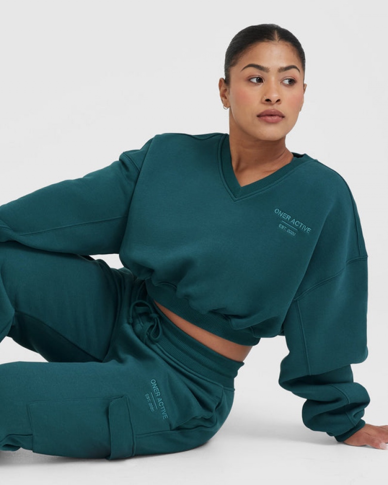 Blue / Turquoise Oner Active All Day Est 2020 Crop V-Neck Sweatshirts | 73985FICD